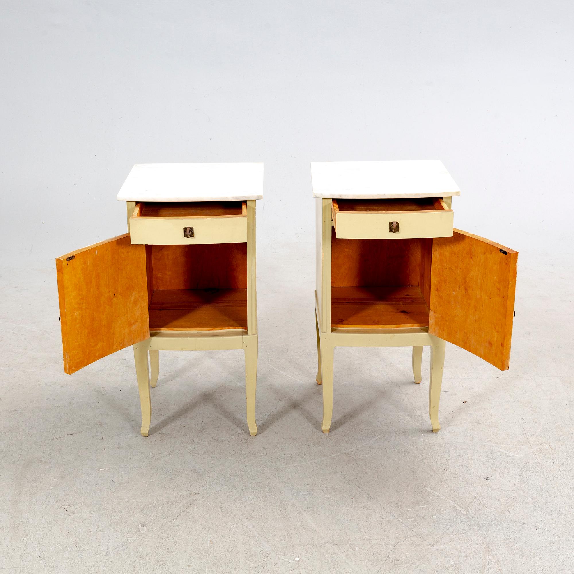 A pair of painted bedside tables first half of the 20th century.