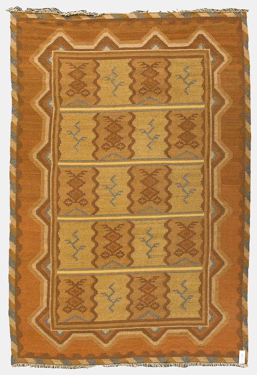 Aino Keinänen-Baeckmann, A 1920s Finnish flat weave carpet. Circa 300 x 203 cm.