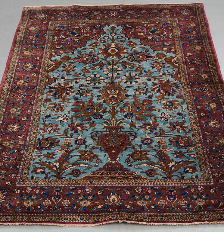 MATTO, a semi-antique silk Kashan, ca 201,5 x 122-130 cm.