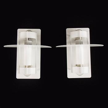 A set of two wall lamps by Joachim Lepper for Louis Poulsen, Danmark.
