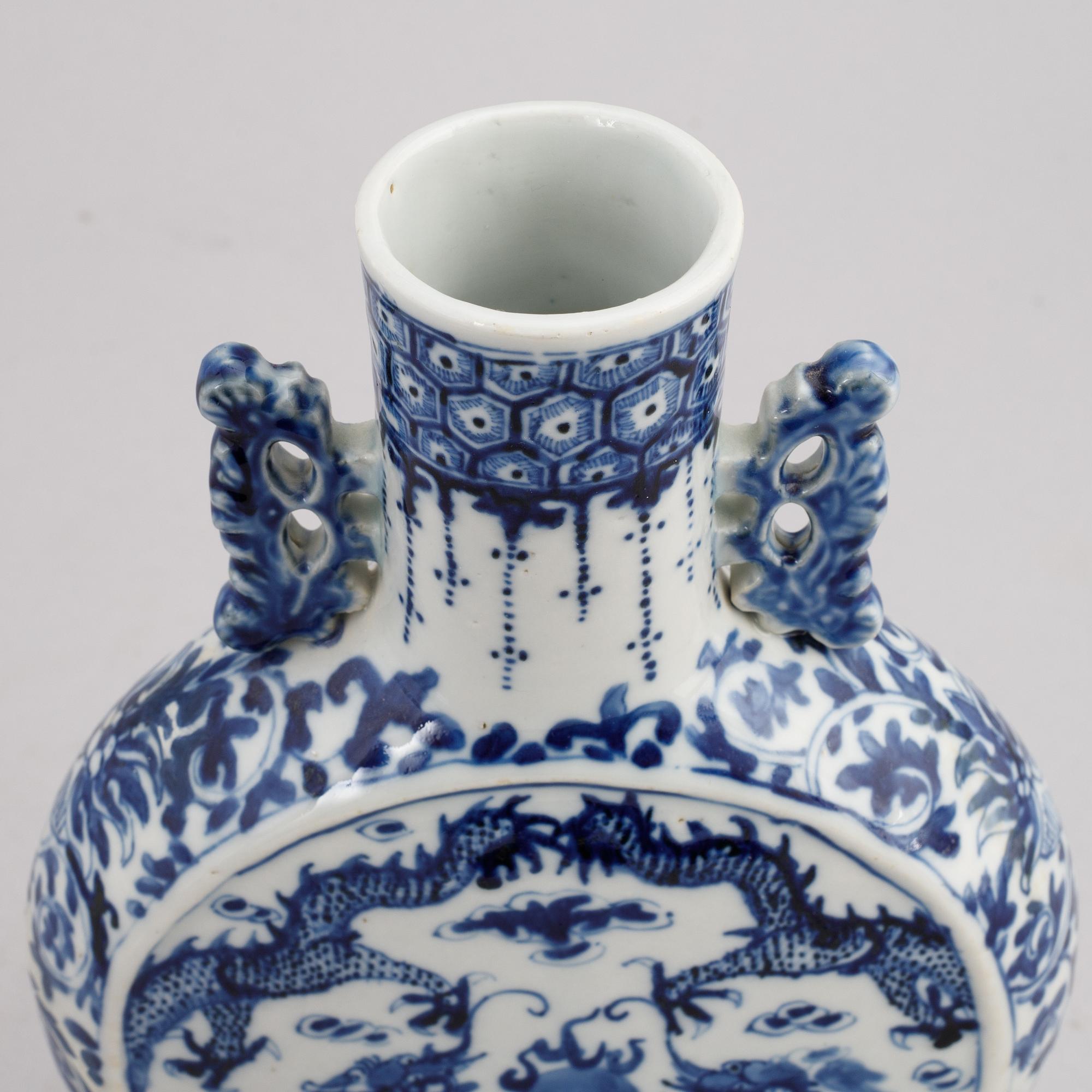 A Chinese blue and white porcelain moon flask, presumably 20th century.
