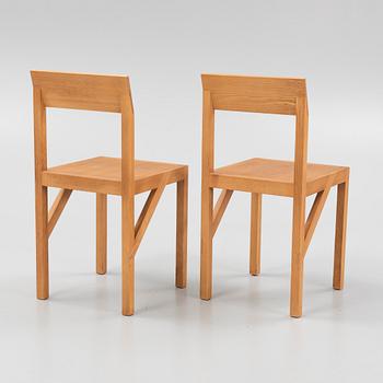 A pair of signed stained pine 'Bracket Chairs' by Frederik Gustav for Frama, Copenhagen 2023.