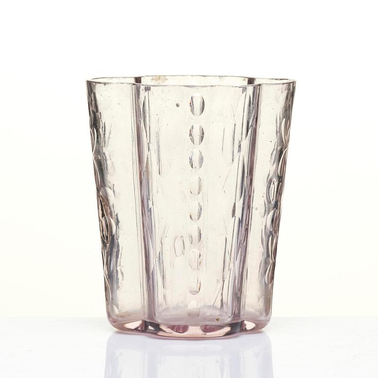 An amethyst coloured suger shaker and a cut glass goblet, 18th century.