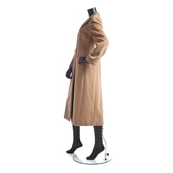 GIORGIO ARMANI, a beige cashmere coat.