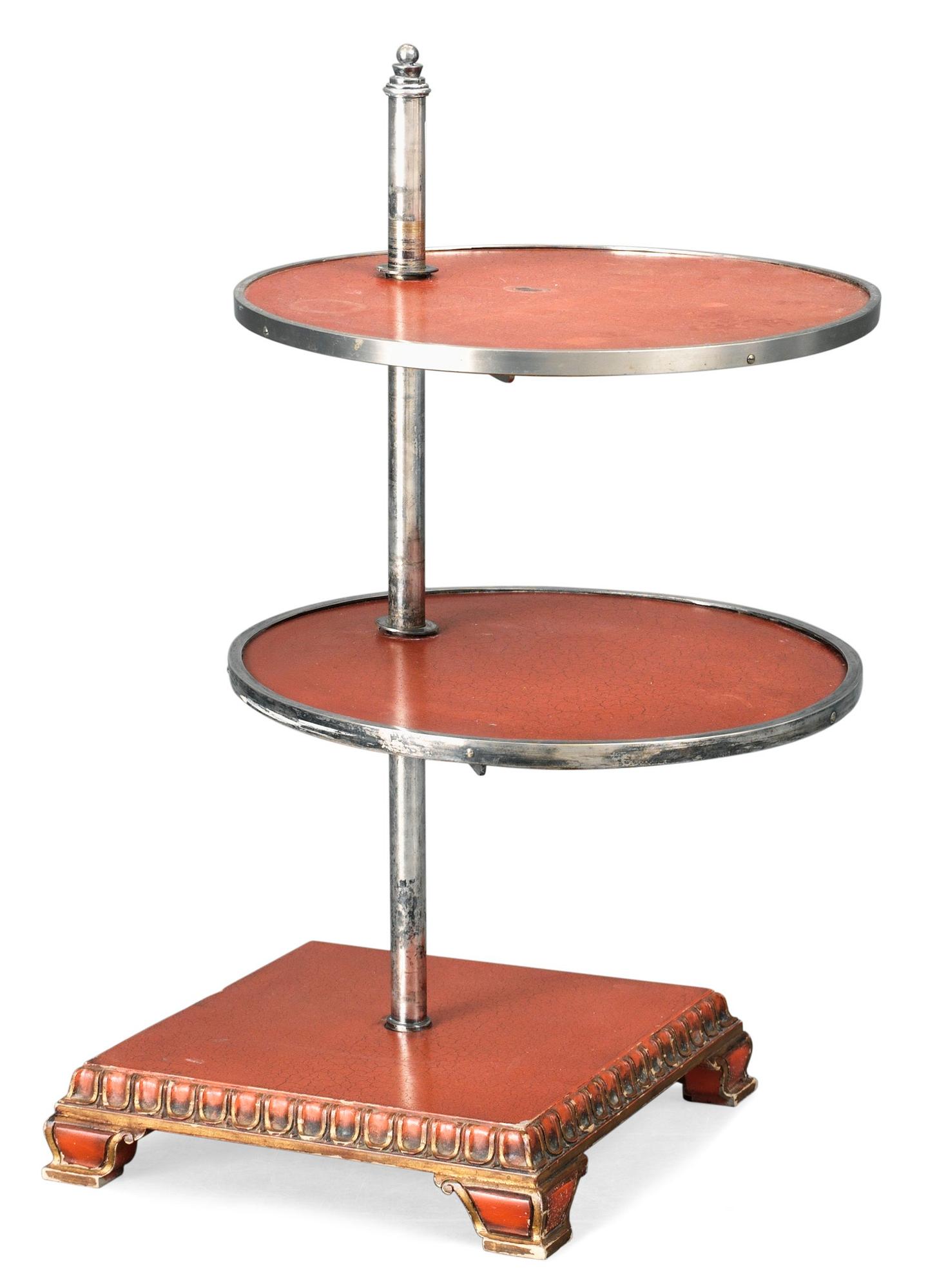 An Axel-Einar Hjorth  red lacquered table "Åbo" on a silverplated brass leg, Nordiska Kompaniet 1929-30.