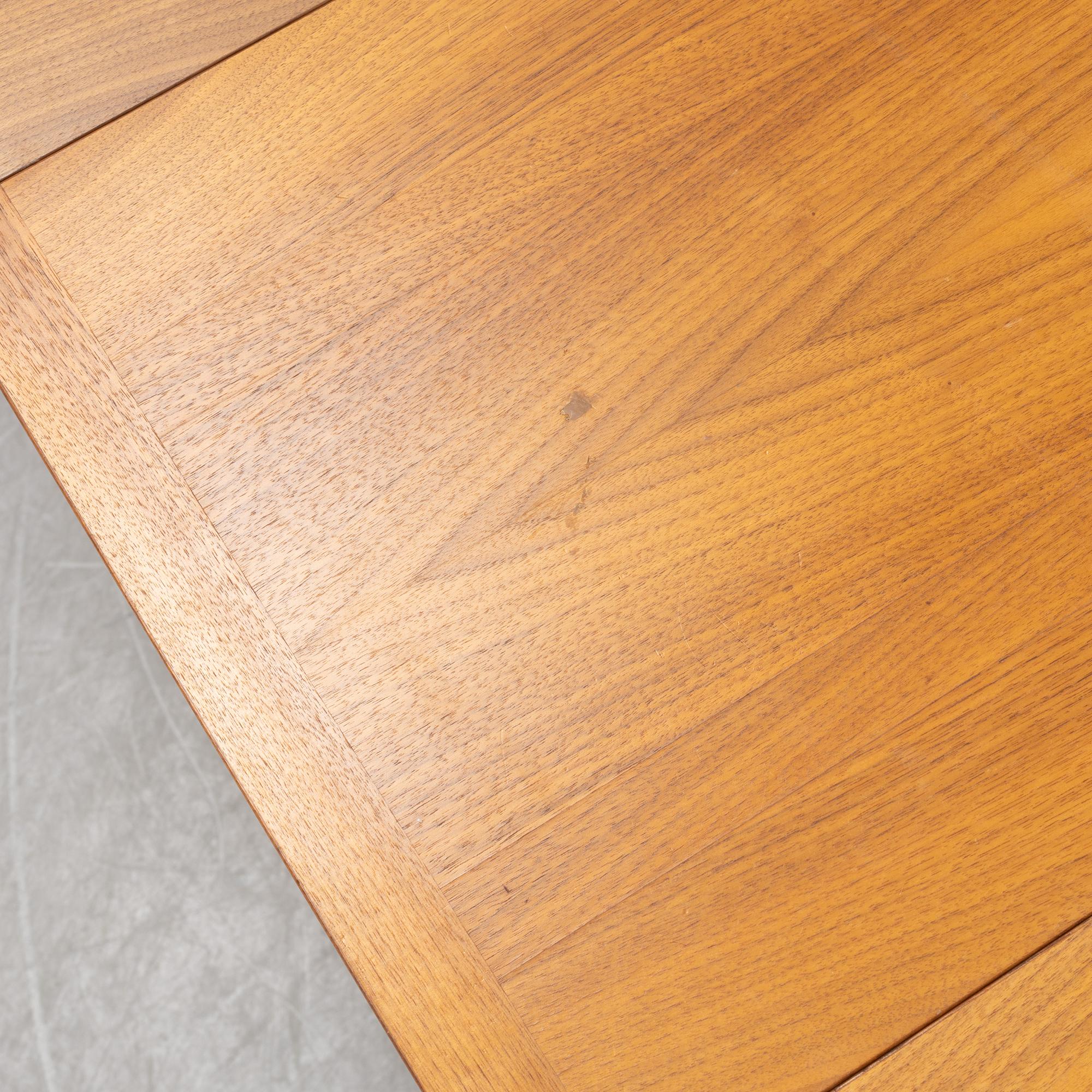 A teak veneered dining table, 1960's.