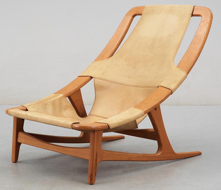 An Arne Tidemand Ruud teak and leather easy chair, by Norcraft,