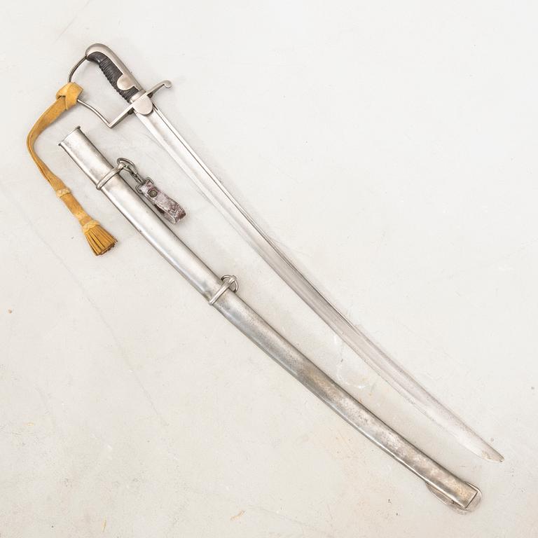 A Swedish artillery sword , 1831 pattern. with scabbard.