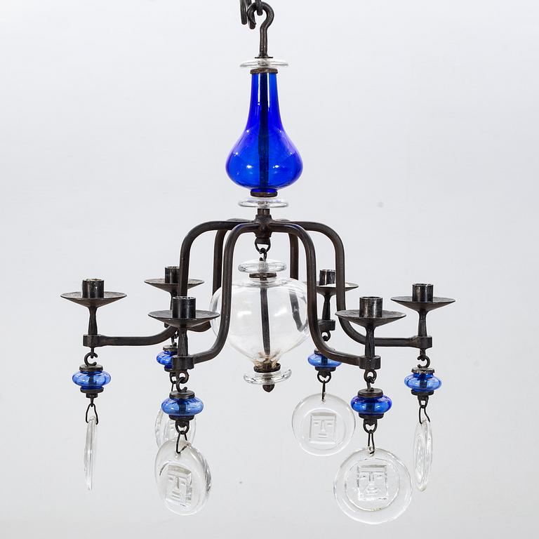 ERIK HÖGLUND, a cast iron and glass chandelier.