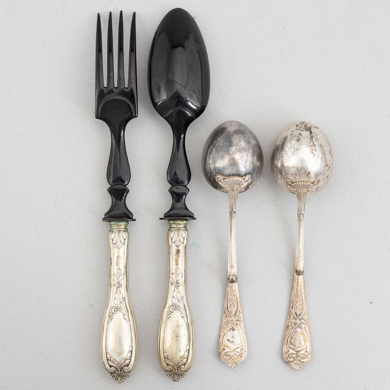 A pair of silver serving cutlery and a pair of sauce spoons, including Germany, early 20th century.