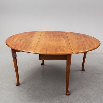 An end of the 19th Century mahogany drop leaf table.