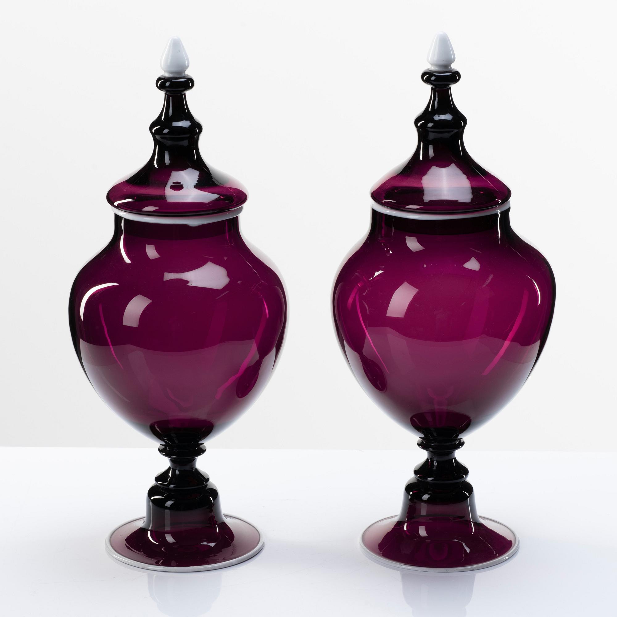 A pair of purple glass jars with covers, presumably Norway, 19th Century.