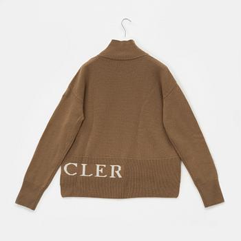 Moncler, A 'Lupetto tricot' wool turtleneck sweater, size M.