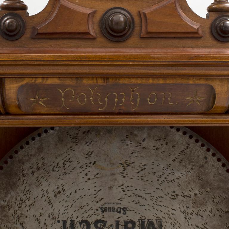 Polyphone with clock in walnut case, late 19th Century.