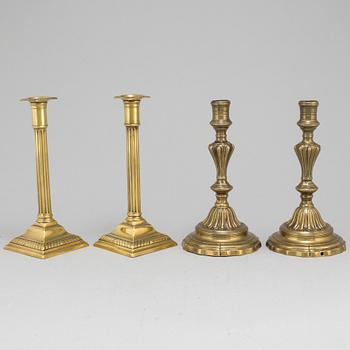 CANDLESTICKS, two pairs, brass, 18th and 19th century.