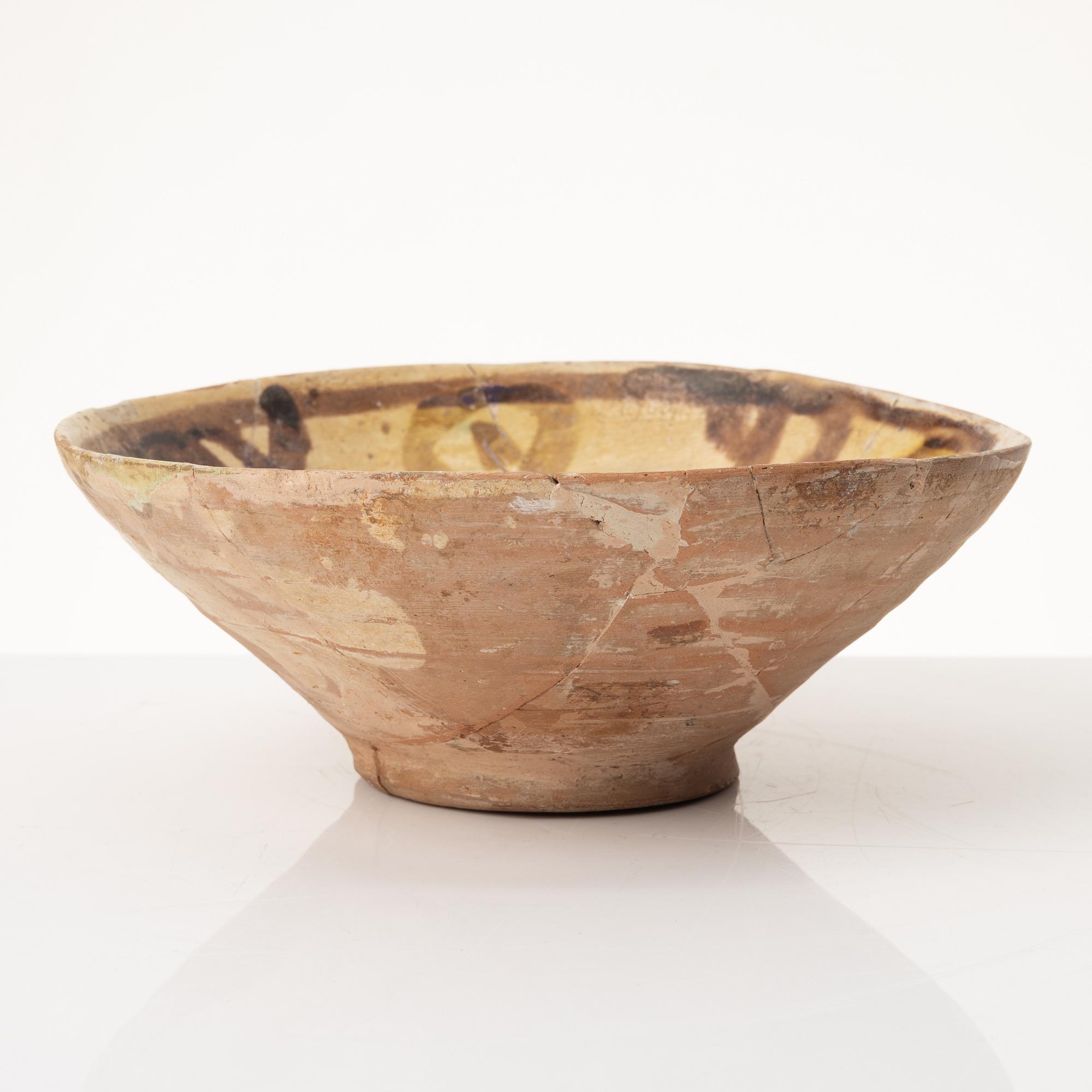 A glazed earthenware bowl, possibly Hispano-Moresque.