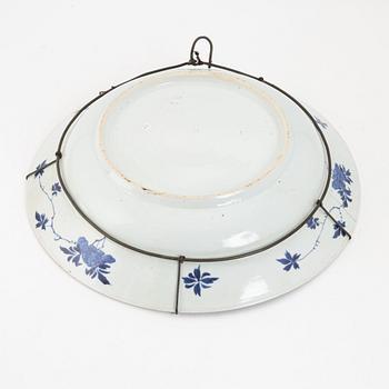 A Chinese blue and white Kangxi-style dish, 19th century.