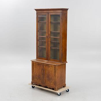 A 19th century walnut veneered  book cabinet.