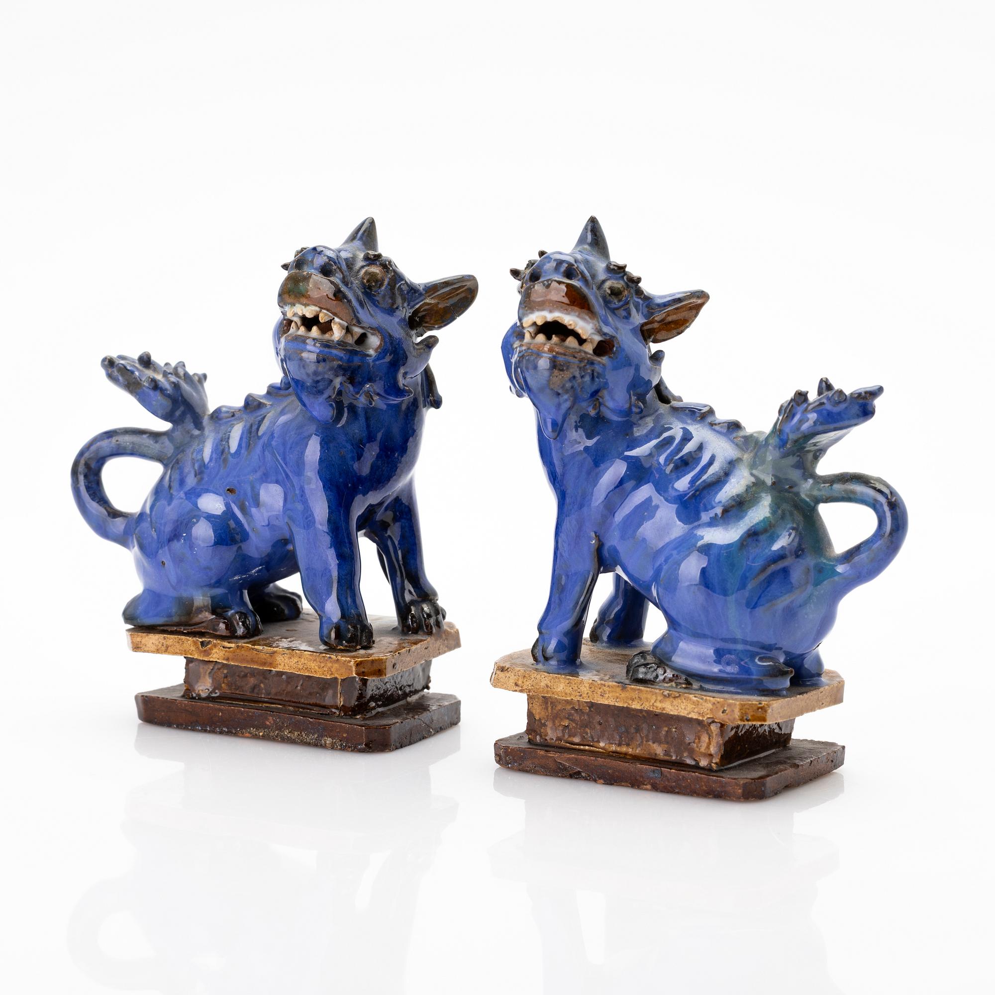 A pair of Chinese buddhist lions, Qing dynasty, 19th century.
