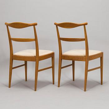 A set of four 1960s oak chairs.