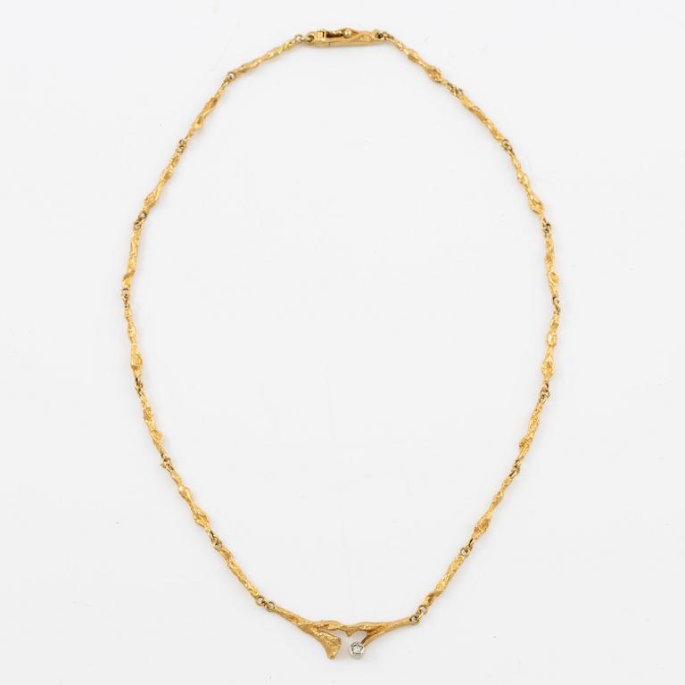 A Lapponia necklace, "Vårdagg", 18K gold with diamond.