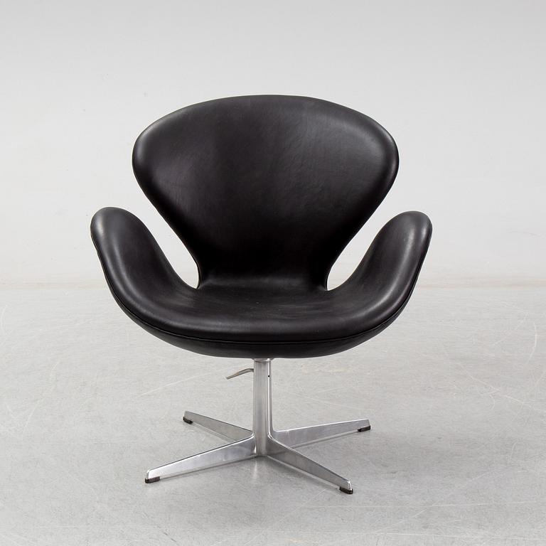 Arne Jacobsen, a black leather 'Swan' chair, Fritz Hansen, Denmark, 1967.