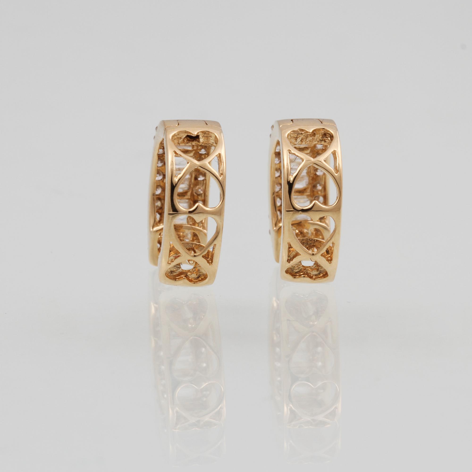 ÖRHÄNGEN, 18K guld med briljant och baguettslipade diamanter ca 0.50 ct. Vikt 2,5 gram.