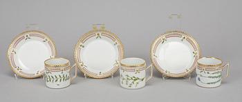 A set of three plus one porcelain "Flora Danica" coffee cups and saucers, "Royal Copenhagen, Denmark.