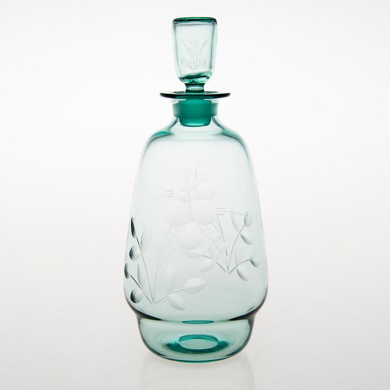 A set of five drinking glasses and a carafe from 1930s.