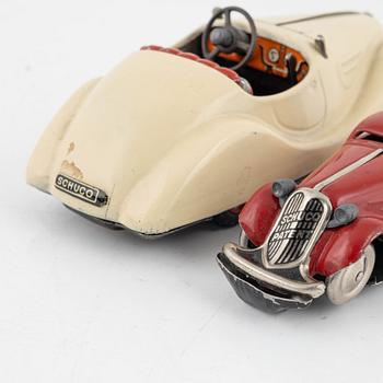 A set of five toy cars, mostly Schuco, Germany.