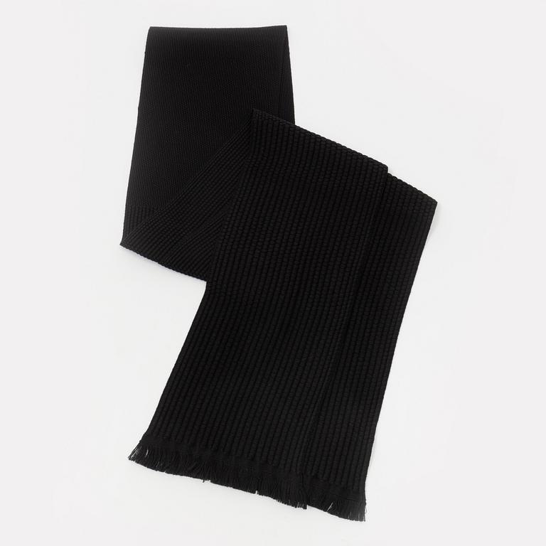 Gucci, a black wool scarf.