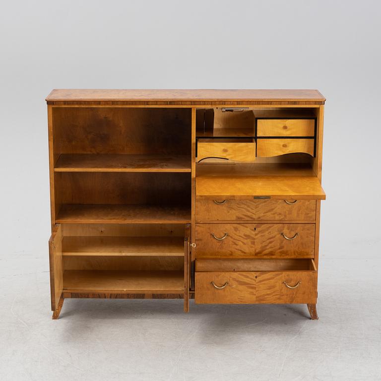 A birch and rosewood veneered bookcase, 1940's.