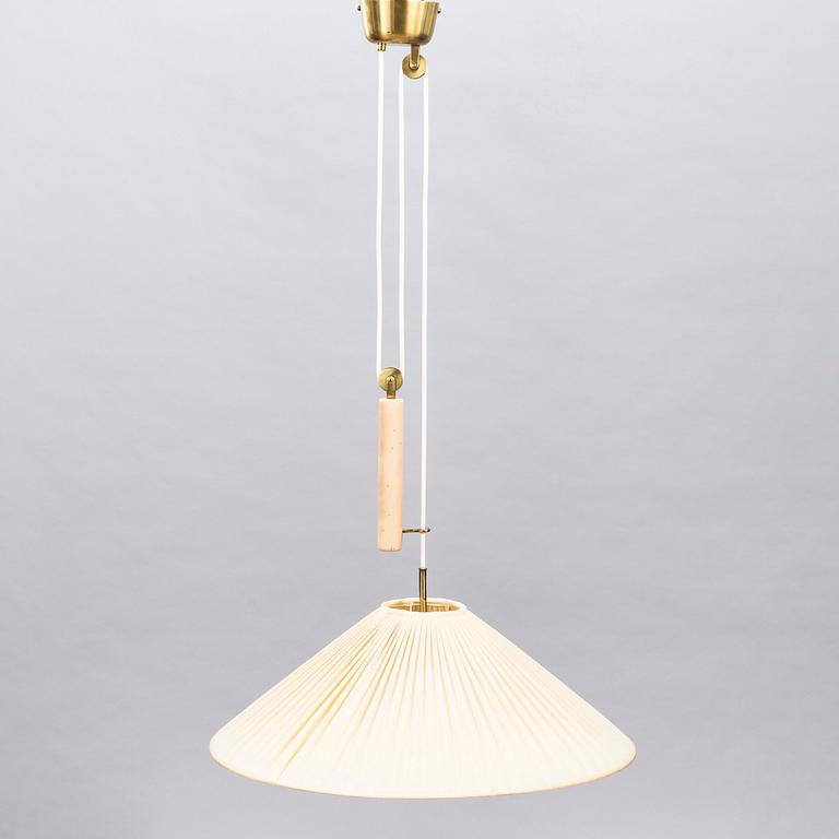 A mid-20th Century ceiling light, model A1998, for Taito Finland.
