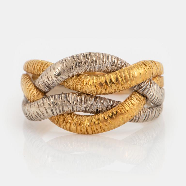 An 18K gold and white gold ring.