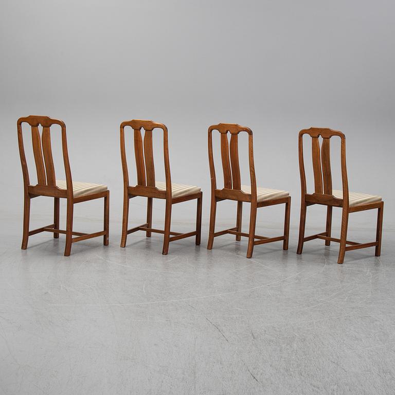 Carl Malmsten, A five-piece walnut 'Ambassadör' dining suite by Carl Malmsten.