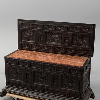 A 19th century baroque style oak chest.