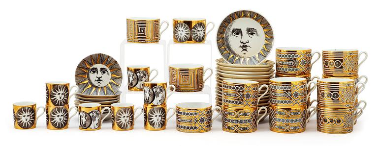 A set of 24 pcs of coffe and espresso cups by Fornasetti, Milano, Italy.