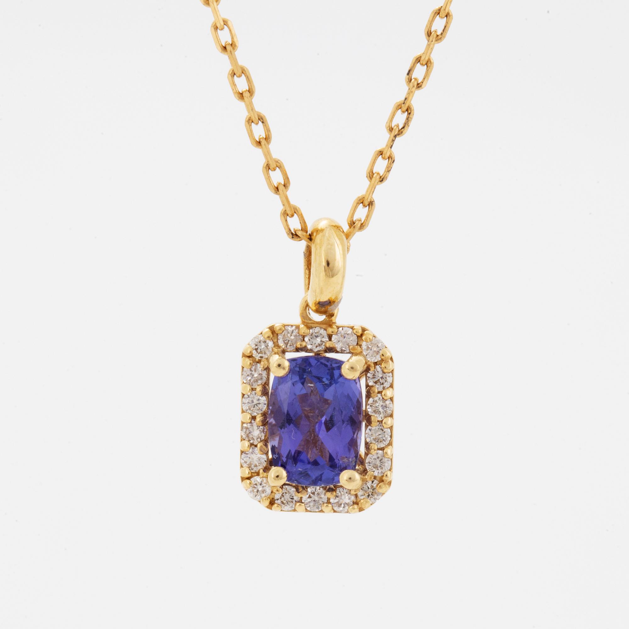An 18K gold necklace set with a faceted tanzanite.