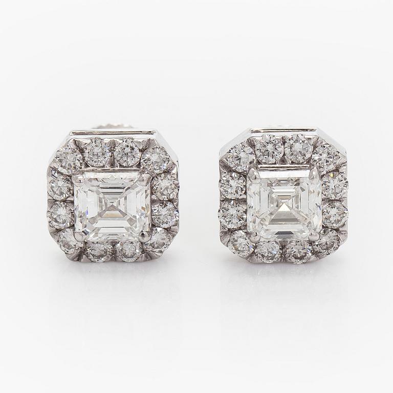 Earrings, emerald cut diamonds 0.70 ct / each and brilliant cut diamonds, 18K white gold.