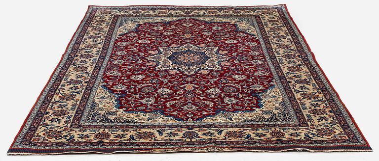 A semi-antique Isfahan rug, Central Persia, signed (Sadegh) Seirafian, c. 237 x 146 cm.