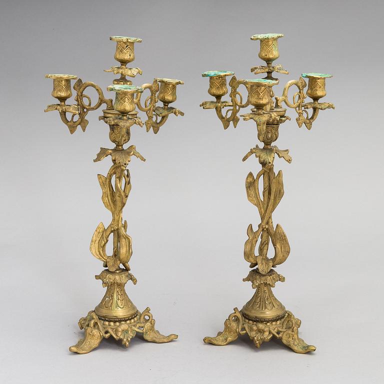A pair of bronze candelabra from the latter half of the 19th Century.
