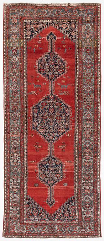 A Malayer runner, west Persia, c. 560 x 200 cm.