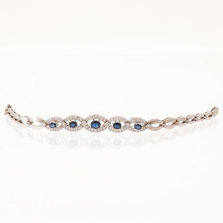 An 18K white gold bracelet set with oval faceted sapphires and brilliant-cut diamonds, Stockholm.