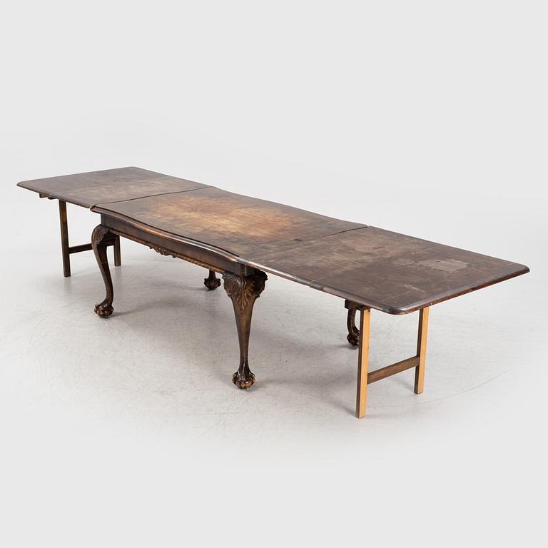 A birch dining table, first half of the 20th century.
