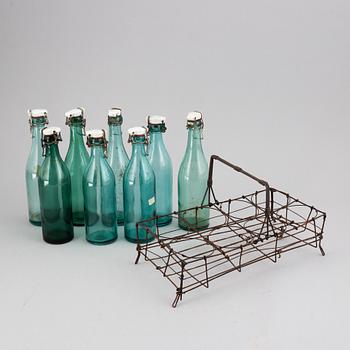 A metal bottle holder, first half of the 20th century.
