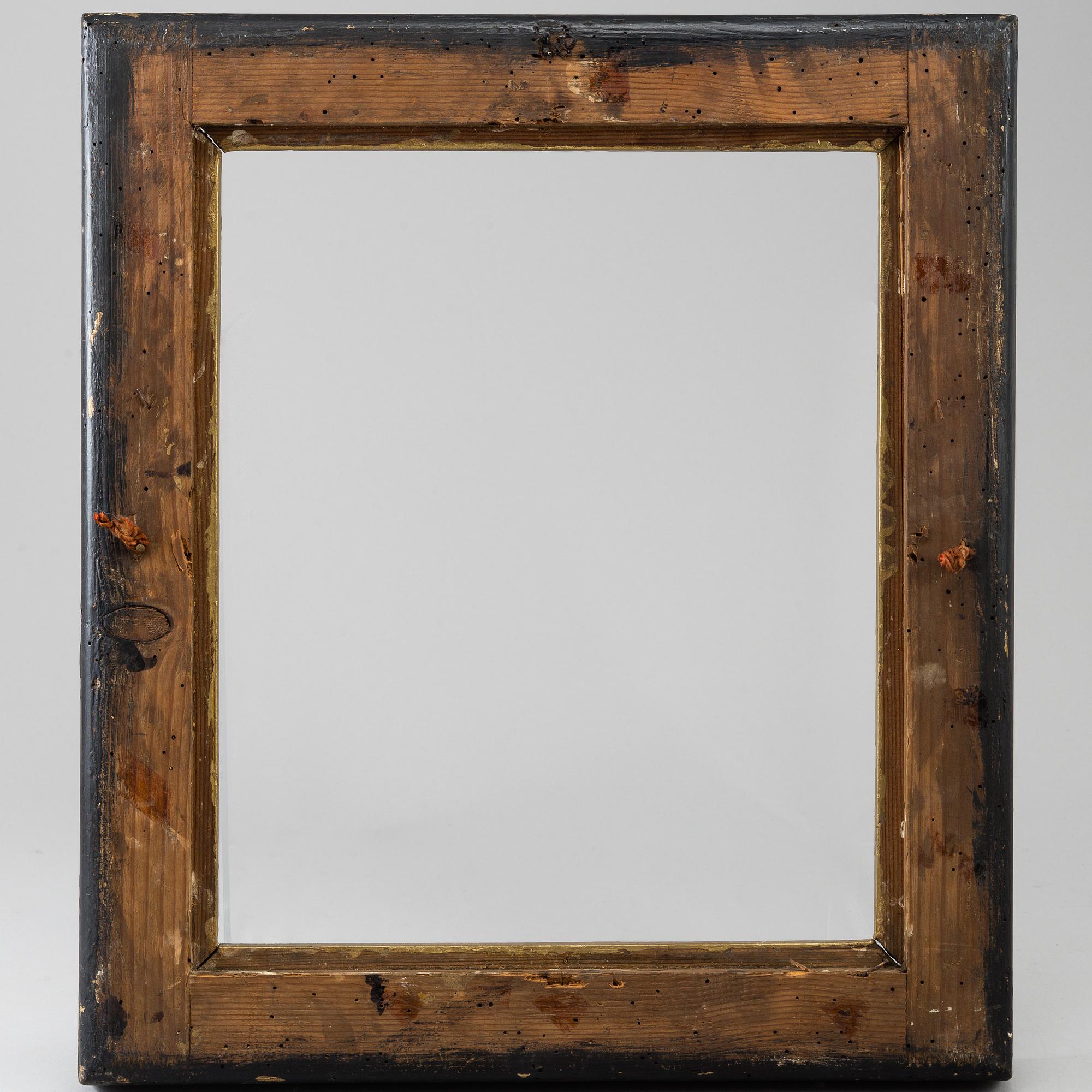 An 18th century wooden frame.