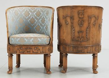 A pair of Axel Einar Hjorth stained birch armchairs 'Caesar' by NK 1928.