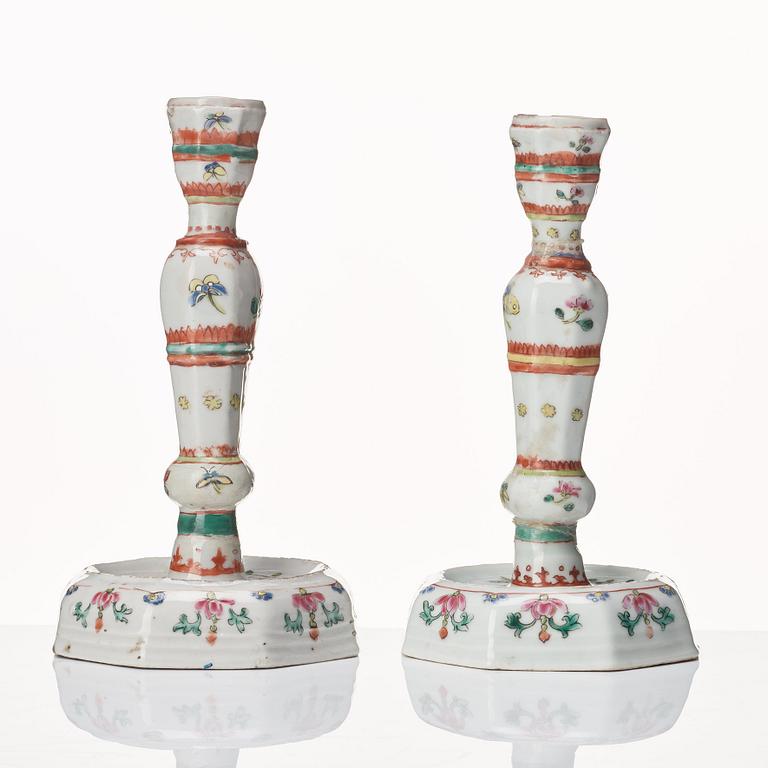 Two famille rose candle sticks, Qing dynasty, 18th Century.