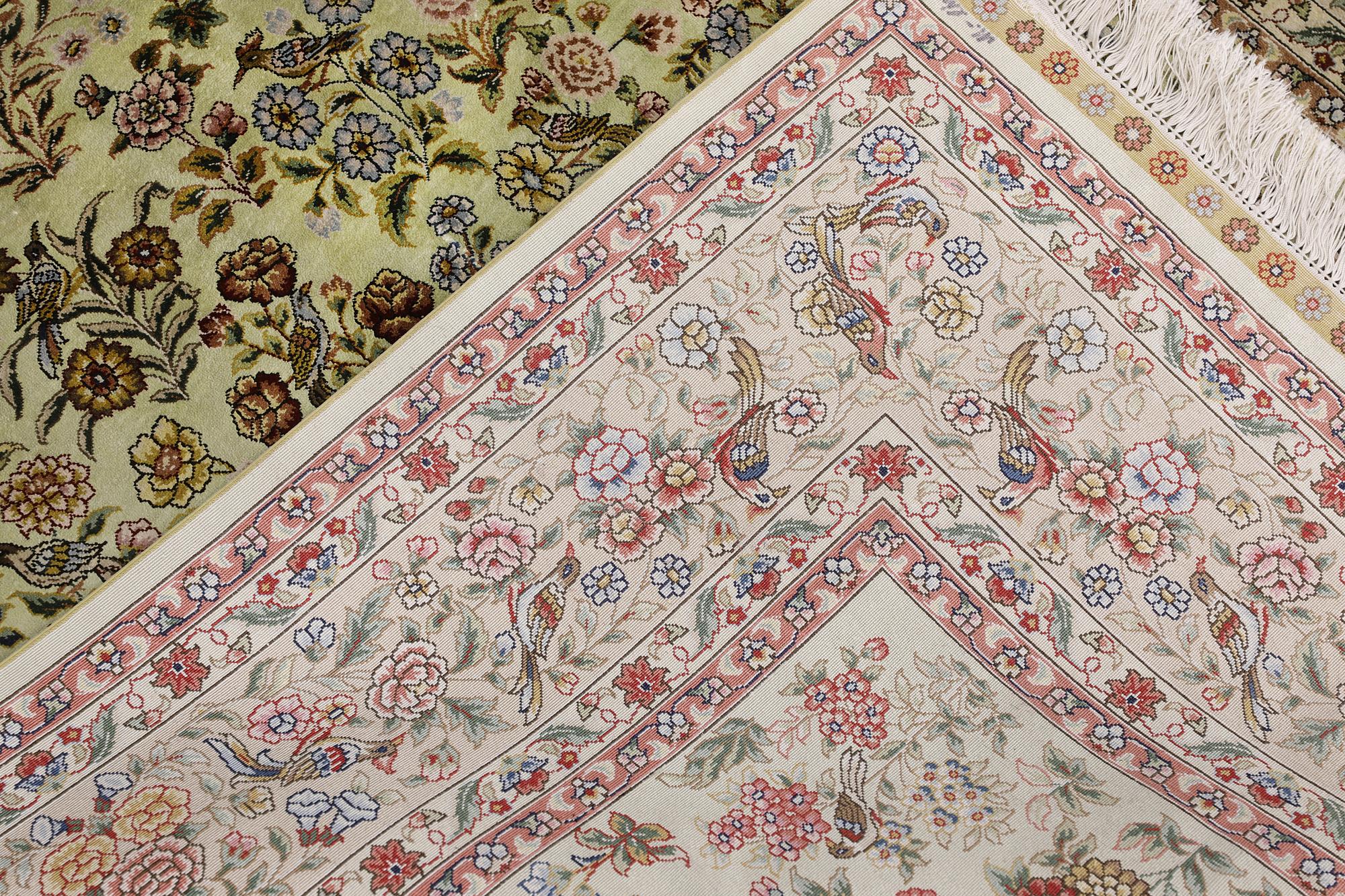 A oriental silk rug, 183 x 129 cm.
