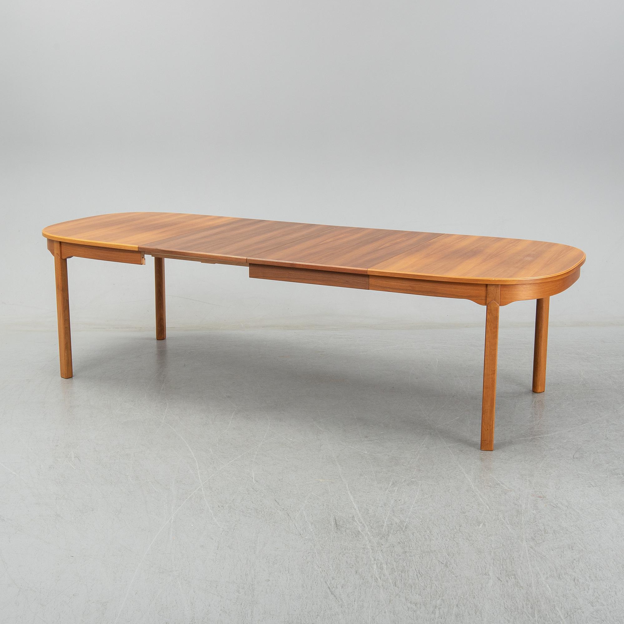 An 'Ambassador' dining table by Carl Malmsten, Åfors.